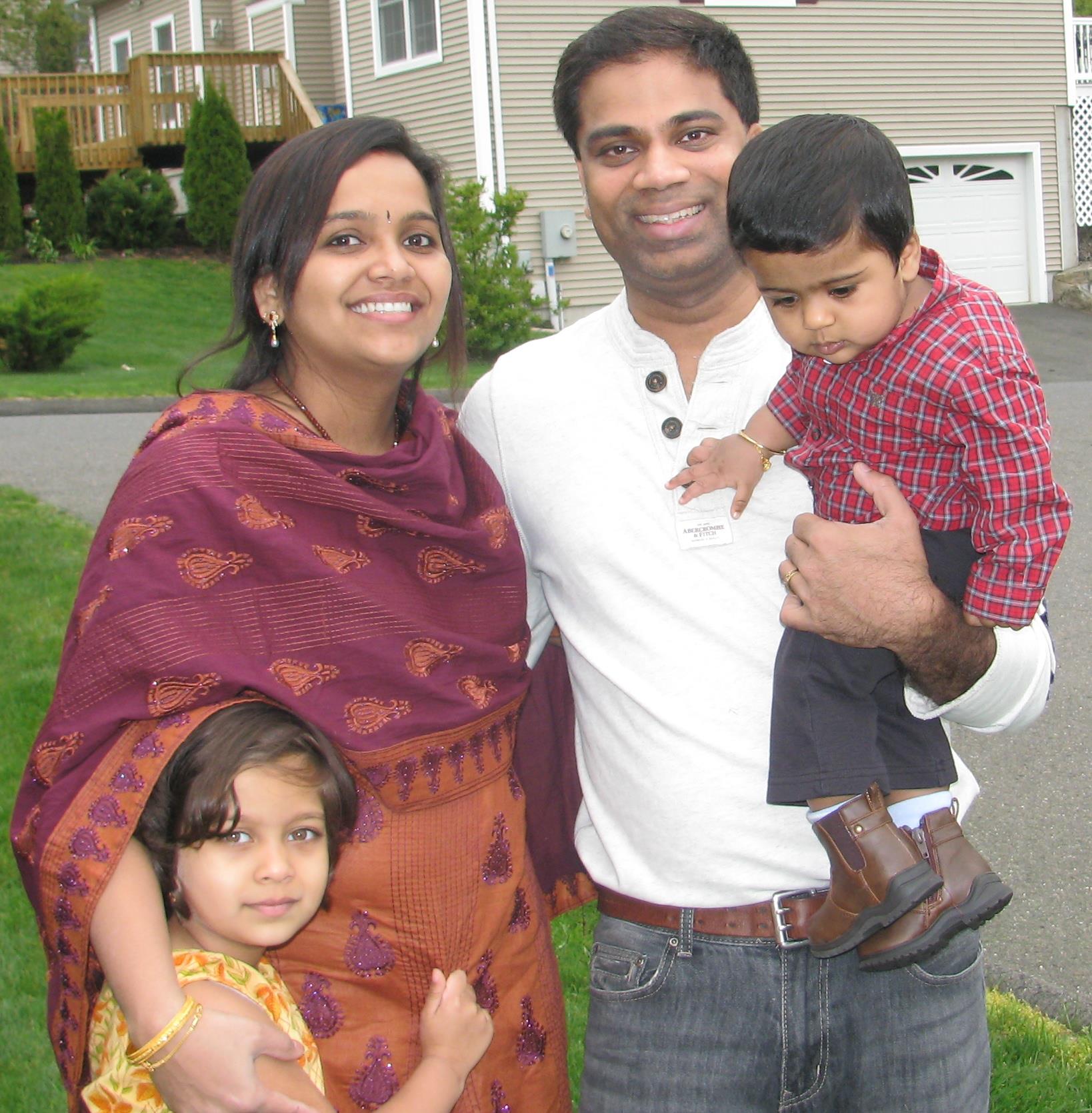 Bachi, Harini, Ruthika, and young Rithvik together outside their home