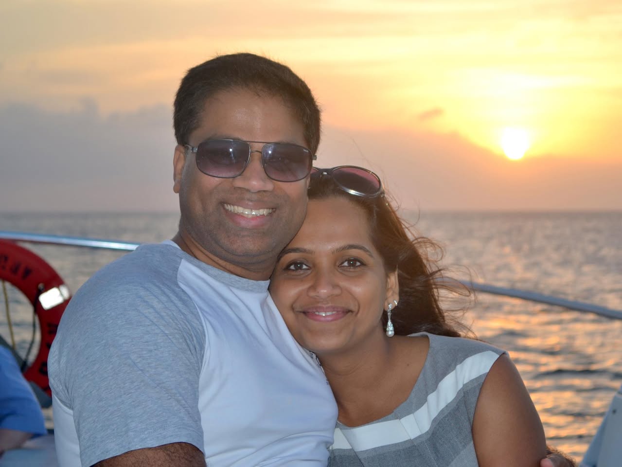 Bachi and Harini together at sunset on the water