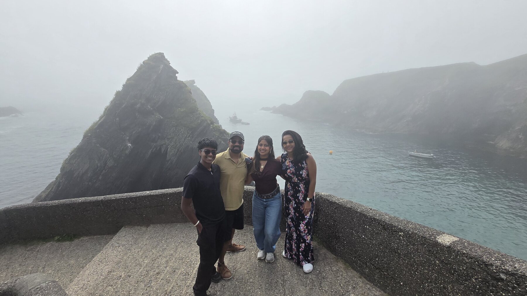 The Giduthuri family overlooking the Dingle Peninsula in Ireland